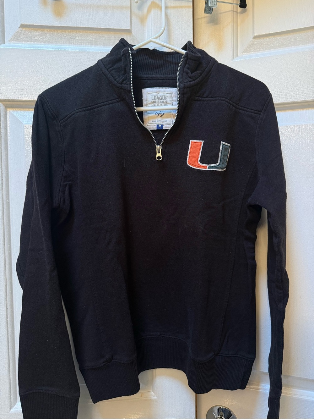 League Black Quarter-Zip Sweater with Orange and Green 'U' Patch